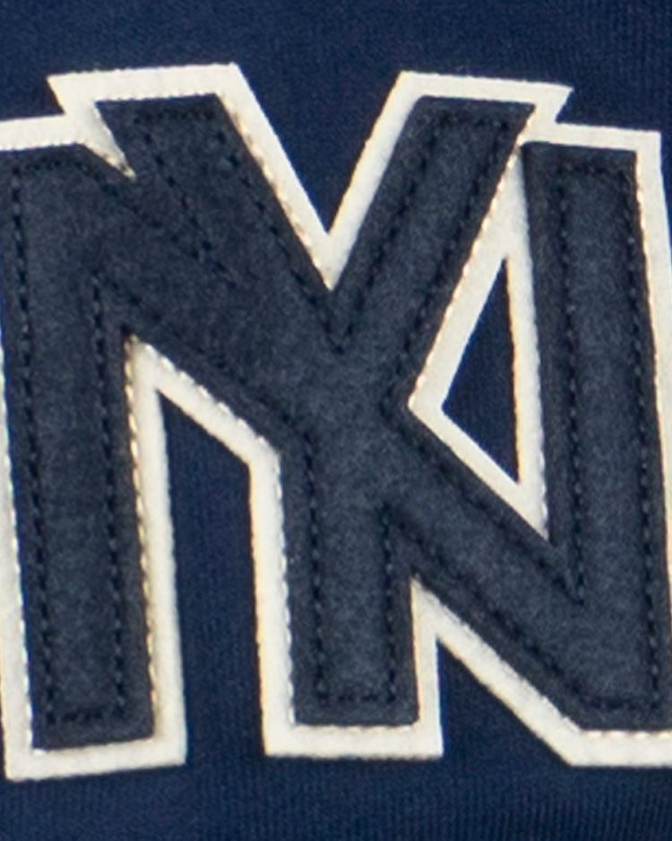 The Brooklyn Eagles French Terry Script Hooded Sweatshirt by EFF features a navy patch with overlapping white and navy N shapes, outlined in white stitching, inspired by the Newark Eagles legacy.