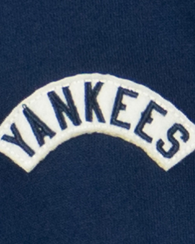 The EFF New York Black Yankees French Terry Script Hooded Sweatshirt in navy features YANKEES in blue capitals on a white patch, honoring legends from The House That Ruth Built and the Negro National League.