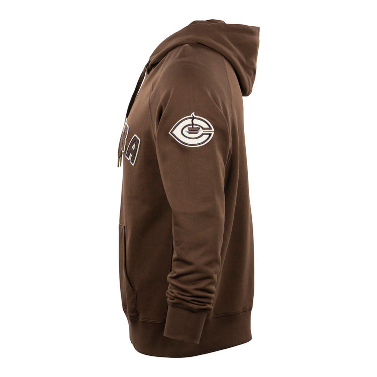 The EFF Cordoba Cafeteros French Terry Script Hooded Sweatshirt in brown is shown from the side, featuring a front pocket, partial ORA chest text, and a stylized eye logo patch on the sleeve inspired by Cafeteros legend Jorge Pasquel.