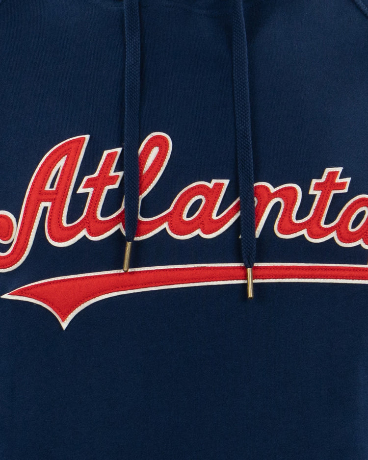 A close-up of the EFF Atlanta Crackers French Terry Script Hooded Sweatshirt, featuring Atlanta in bold red and white script on navy, with metal-tipped drawstrings—paying tribute to the Southern Association’s iconic team.