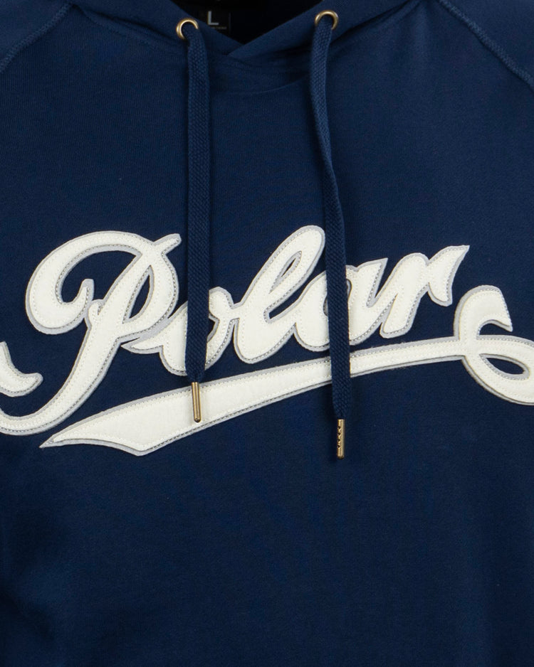 The EFF Cerveceria Polar French Terry Script Hooded Sweatshirt is a navy blue hoodie with Polar in bold white script across the chest, featuring metal-tipped drawstrings—a stylish choice for fans of classic beer or streetwear.