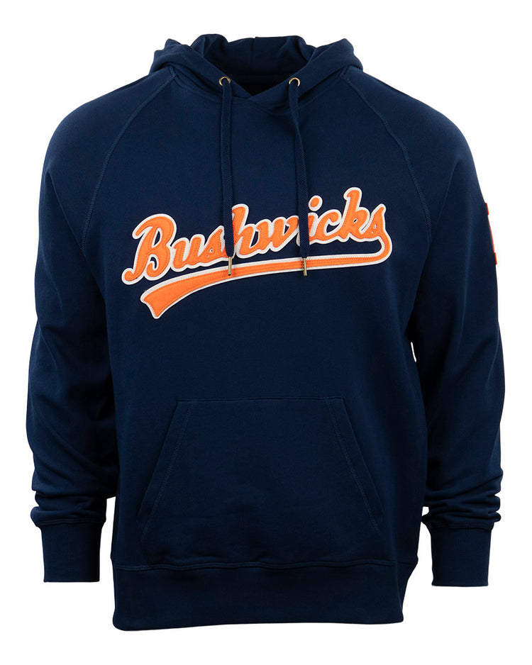 The EFF Brooklyn Bushwicks French Terry Script Hooded Sweatshirt is a navy hoodie with Bushwicks in orange and white script, inspired by the legendary New York baseball club. It features a front pocket and hood drawstrings.