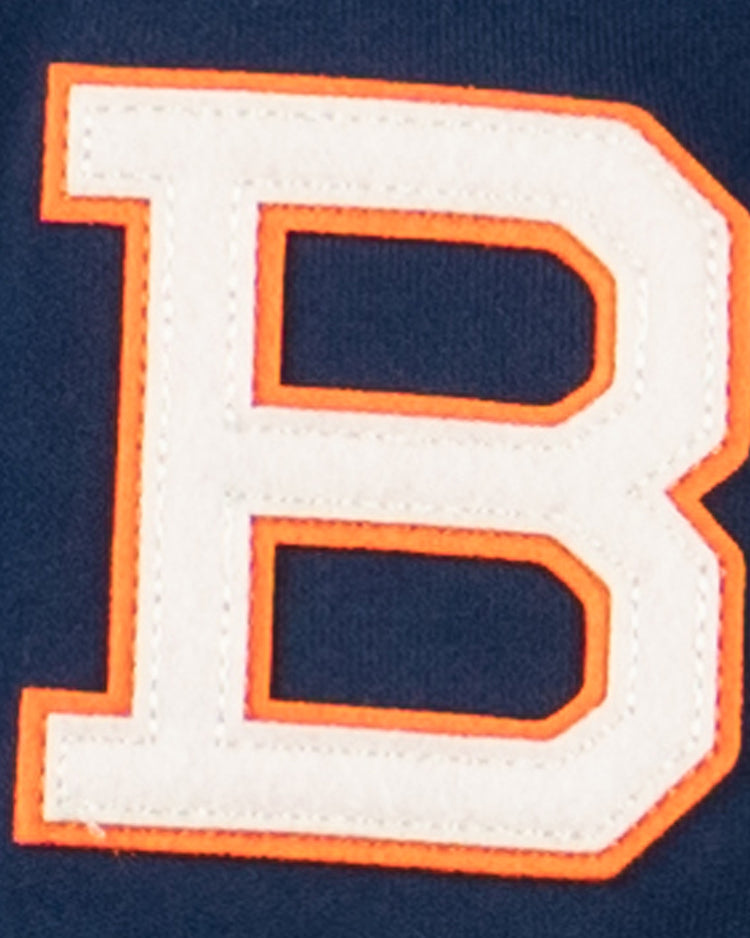 The EFF Brooklyn Bushwicks French Terry Script Hooded Sweatshirt features a large white letter B with an orange outline, inspired by the legendary New York semi-pro baseball club, sewn onto a dark blue background.