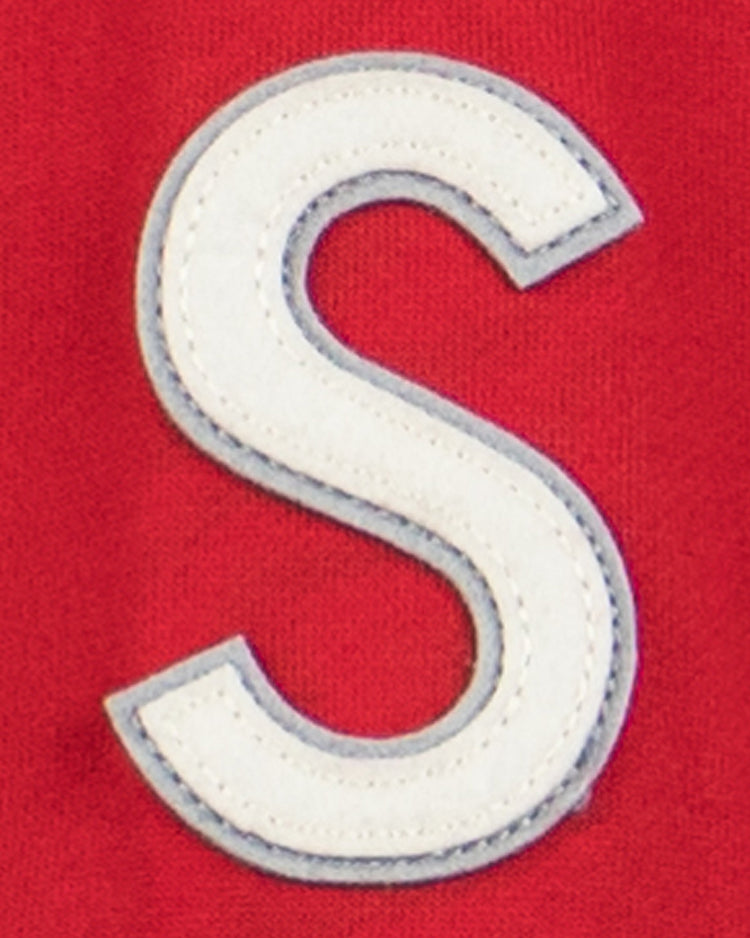 A large white letter S with a gray outline is sewn onto the red French Terry Script Hooded Sweatshirt by EFF, evoking the classic Seattle Rainiers uniforms once seen at Sicks Stadium.