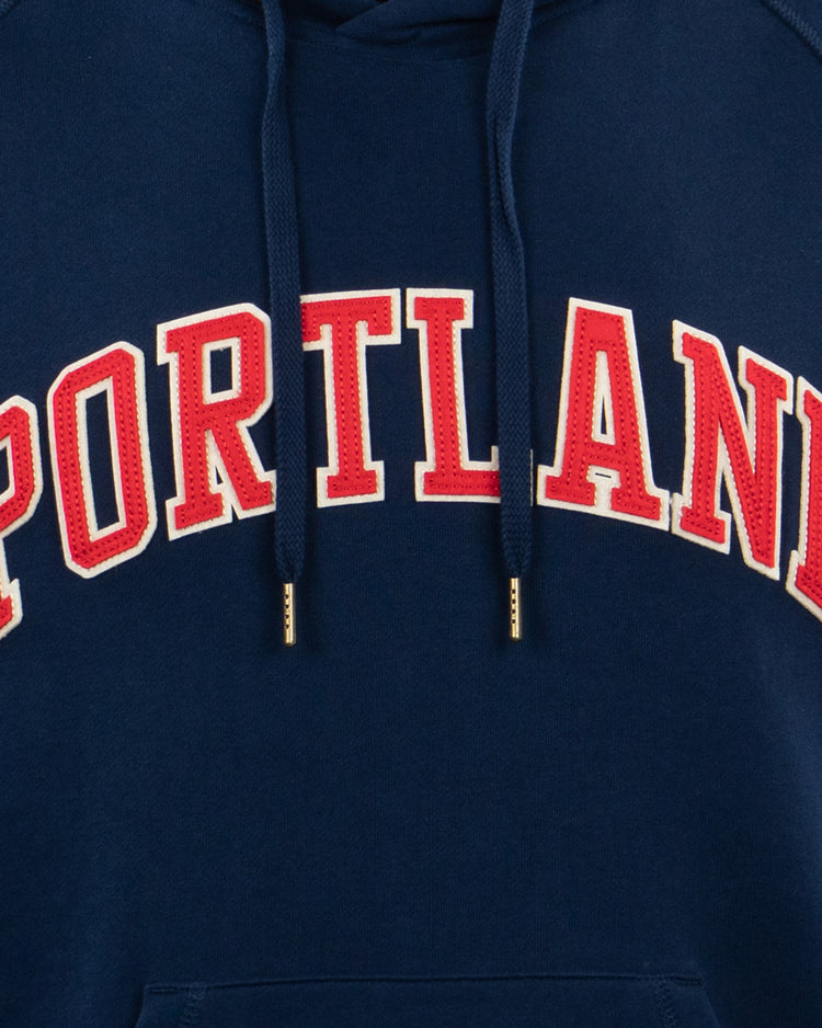 The EFF Portland Beavers French Terry Script Hooded Sweatshirt features bold red and white PORTLAND lettering across the chest and classic hood with two drawstrings, celebrating the Pacific Coast League team.