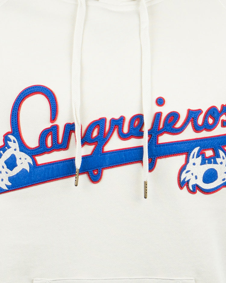 Close-up of the EFF Santurce Cangrejeros French Terry Script Hooded Sweatshirt in natural, showing Cangrejeros in blue and red script, flanked by two blue-and-white crabs and a bat. White drawstrings sit above the design.