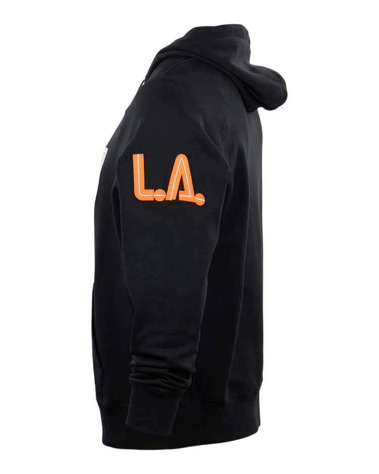 The EFF Los Angeles Aztecs French Terry Script Hooded Sweatshirt in black features bold orange L.A. lettering on the upper sleeve—a subtle tribute to the iconic NASL team.