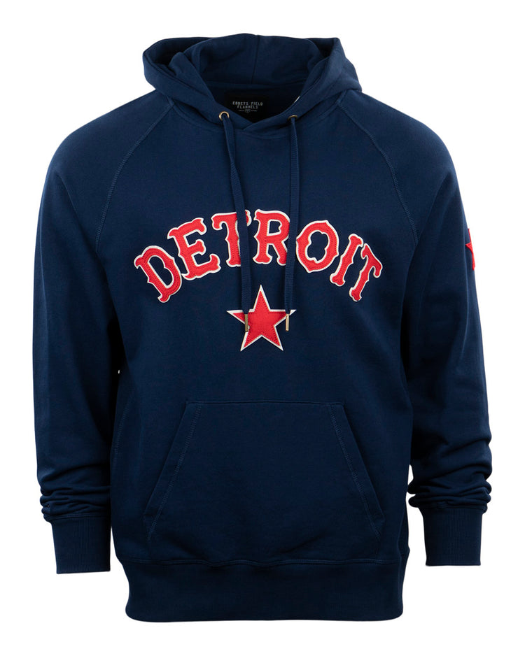 The EFF Detroit Stars French Terry Script Hooded Sweatshirt features DETROIT in bold red letters with a white outline and a red star below, honoring the Detroit Stars. Includes a front pocket and drawstring hood.