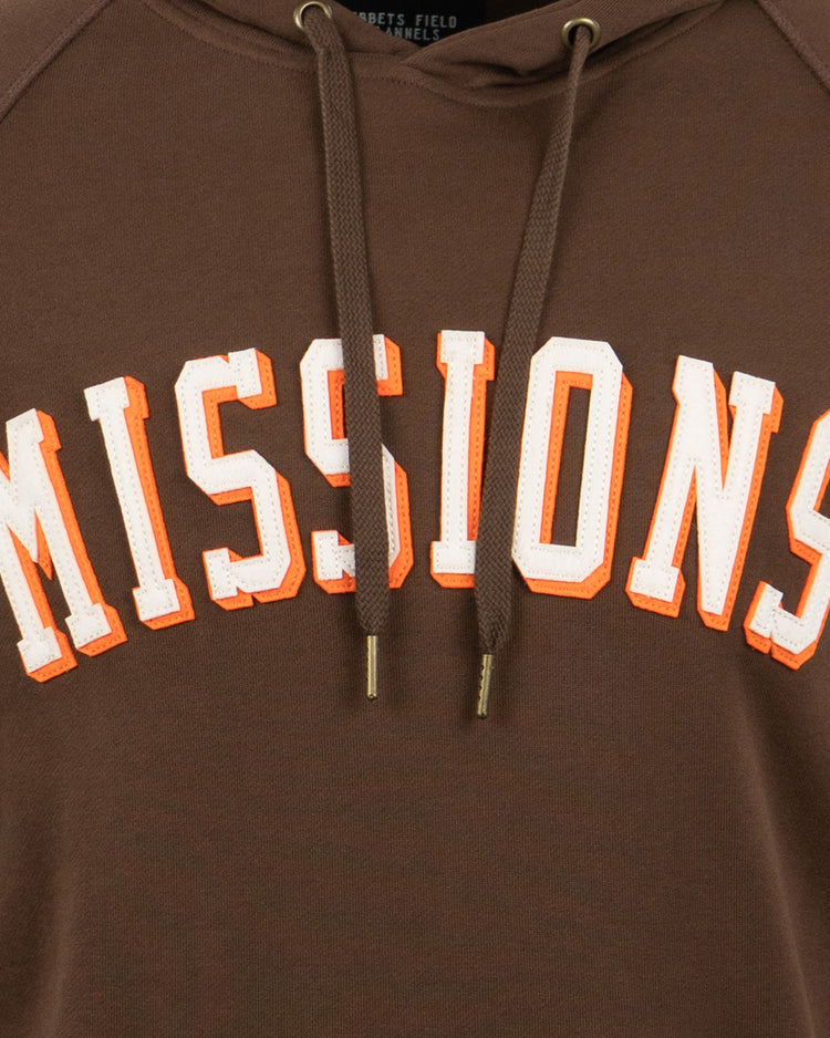 The EFF San Antonio Missions French Terry Script Hooded Sweatshirt features MISSIONS in bold white-and-orange script on a brown base, inspired by San Antonio baseball and the Texas League, with two brown drawstrings.