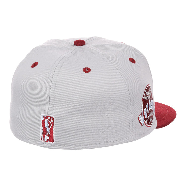 The EFF Veracruz Azules NLB Storm Chasers Fitted Ballcap features a vintage-inspired storm gray crown, red accents on the brim and ventilation holes, plus two embroidered patches honoring Mexican League style.