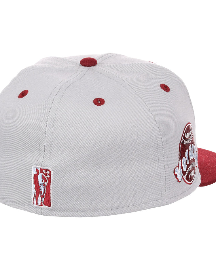 The EFF Veracruz Azules NLB Storm Chasers Fitted Ballcap features a vintage-inspired storm gray crown, red accents on the brim and ventilation holes, plus two embroidered patches honoring Mexican League style.