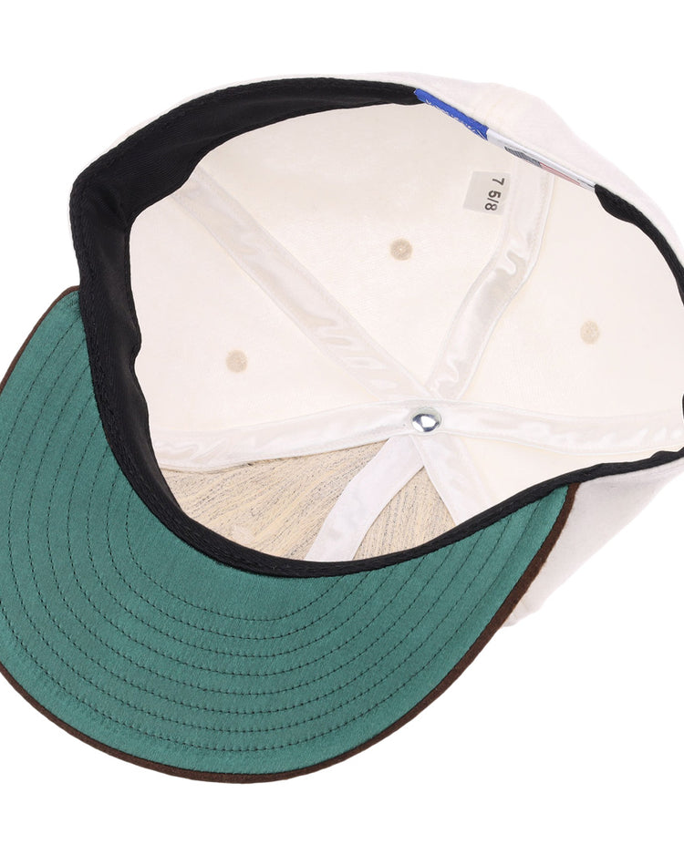 A top-down view of the EFF Chicago Cats Vintage Inspired Ballcap shows a green underbill, black trim, white interior panels with ventilation holes, and a fabric size tag labeled 7 5/8.