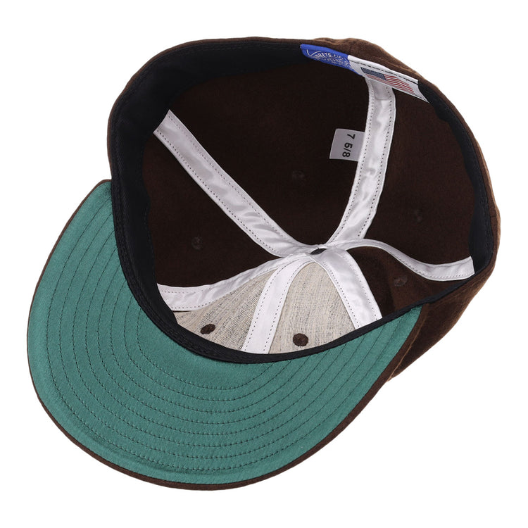 The image shows the inside view of the EFF Salt Lake Bees Vintage Inspired Ballcap in brown, featuring a green brim, white inner seams, blue size tag on the inner band, and a black sweatband with stitched detailing.