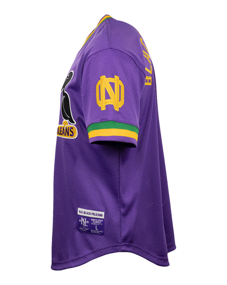 The EFF New Orleans Black Pelicans Vintage Inspired NL Replica V-Neck Mesh Jersey is purple mesh with green-yellow trim, a penguin graphic, Orleans, yellow sleeve logo, and BLK FLCLNS on the back—honoring the historic team.