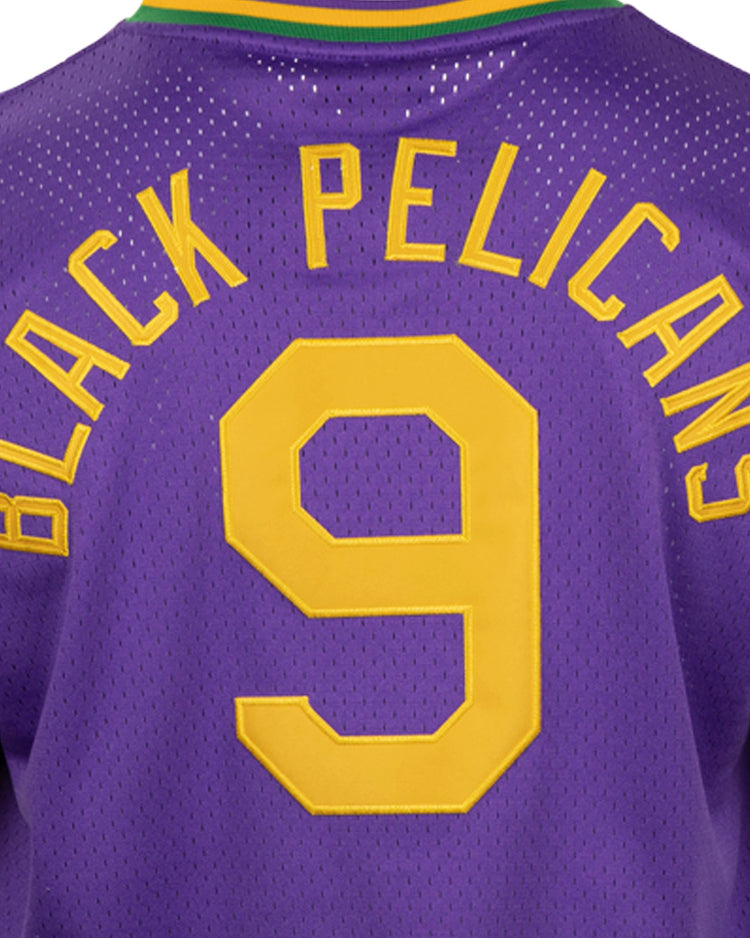 The EFF New Orleans Black Pelicans Vintage Inspired NL Replica V-Neck Mesh Jersey features purple mesh, yellow BLACK PELICANS lettering and number 9 on back, plus green, yellow, and purple striped collar.