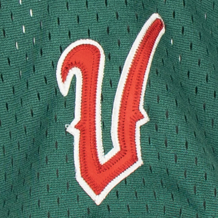 The EFF Veracruz Azules Vintage Inspired Replica V-Neck Mesh Jersey features a green mesh fabric with a red and white stitched V logo, evoking classic Major League Baseball team styles.