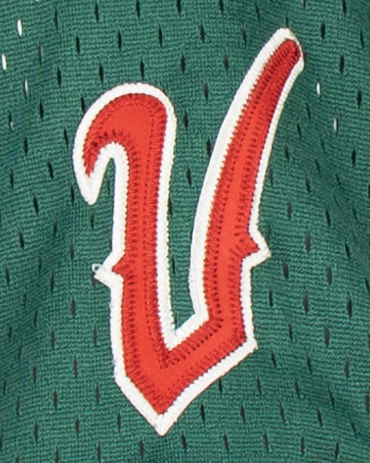 The EFF Veracruz Azules Vintage Inspired Replica V-Neck Mesh Jersey features a green mesh fabric with a red and white stitched V logo, evoking classic Major League Baseball team styles.