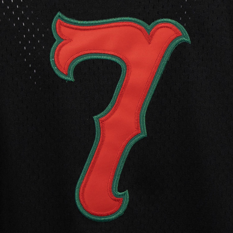 The EFF Veracruz Azules Vintage Inspired Replica V-Neck Mesh Jersey features a bold red number 7 with a green outline stitched onto black mesh, evoking classic Mexican League jerseys.