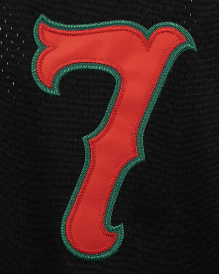 The EFF Veracruz Azules Vintage Inspired Replica V-Neck Mesh Jersey features a bold red number 7 with a green outline stitched onto black mesh, evoking classic Mexican League jerseys.