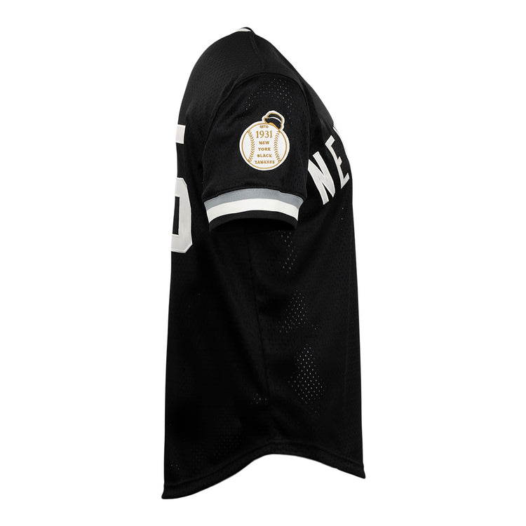 The EFF New York Black Yankees Vintage Inspired NL Replica V-Neck Mesh Jersey in black features “NE” on the chest, number 5 on the sleeve, and a “1931 Home of the Yankees” patch honoring the Negro National League team.