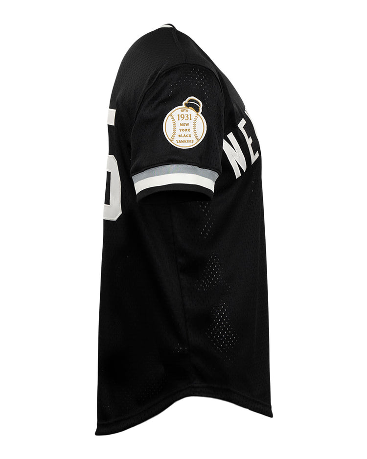 The EFF New York Black Yankees Vintage Inspired NL Replica V-Neck Mesh Jersey in black features “NE” on the chest, number 5 on the sleeve, and a “1931 Home of the Yankees” patch honoring the Negro National League team.