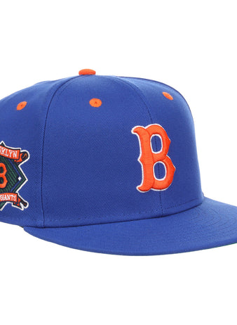 The EFF Brooklyn Royal Giants NLB Flip Fitted Ballcap is a vintage-inspired royal blue cap featuring a bold 3D embroidered orange B on the front and a side patch with Brooklyn Royal Giants and an orange B.