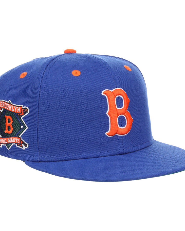 The EFF Brooklyn Royal Giants NLB Flip Fitted Ballcap is a vintage-inspired royal blue cap featuring a bold 3D embroidered orange B on the front and a side patch with Brooklyn Royal Giants and an orange B.