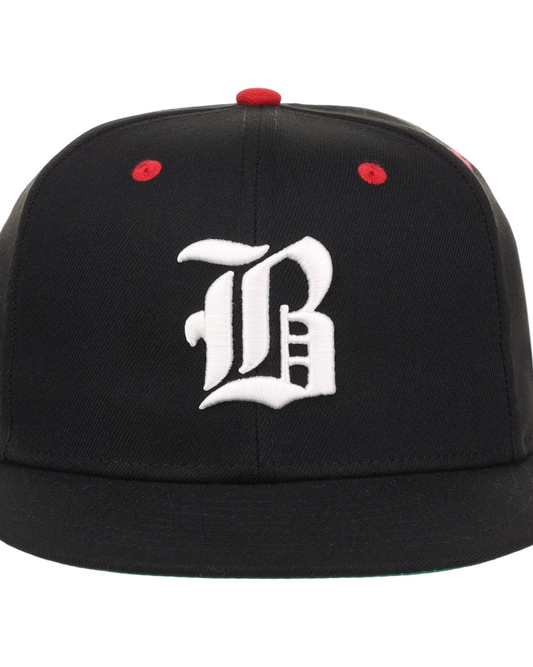 The EFF Birmingham Black Barons NLB Flip Fitted Ballcap features a black design with a bold white B and red accents, inspired by the historic Negro National League team.