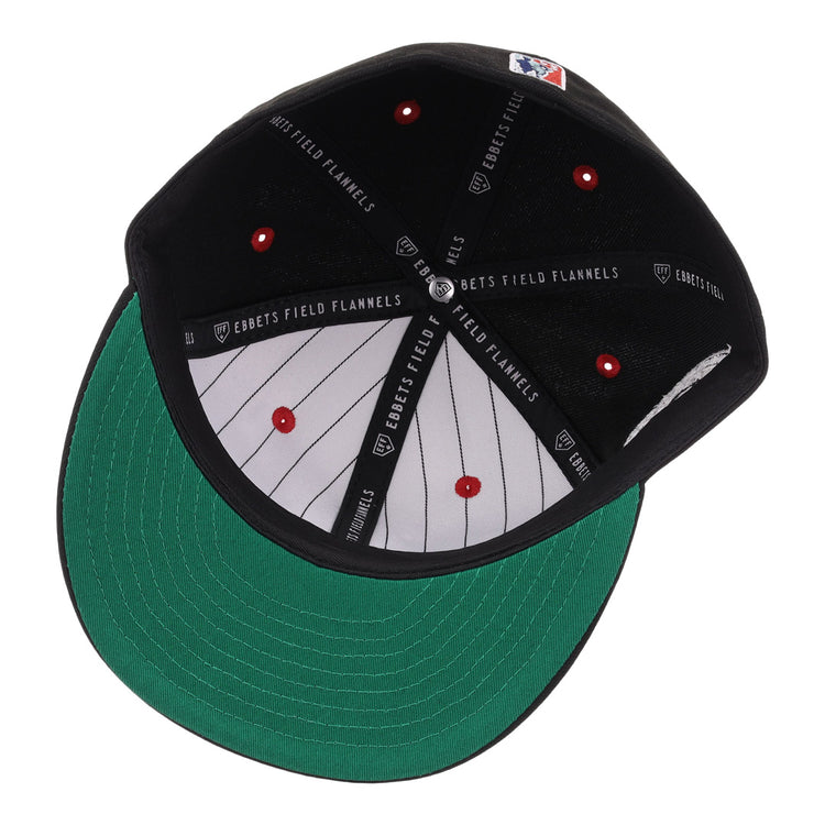 The EFF Birmingham Black Barons NLB Flip Fitted Ballcap features a black exterior, green underbrim, gray pinstriped interior, red button detail, black EBBETS FIELD FLANNELS taping, and honors the Negro National League legacy.