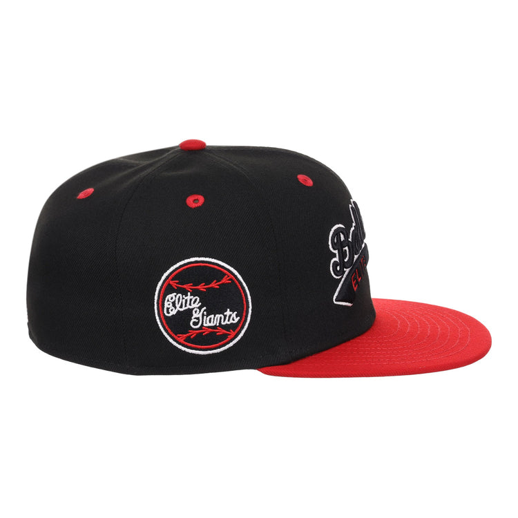 The EFF Baltimore Elite Giants NLB Flip Fitted Ballcap is a vintage-style black cap with a red brim, featuring embroidered logos and an Elite Giants patch—a classic tribute to Negro National League baseball.