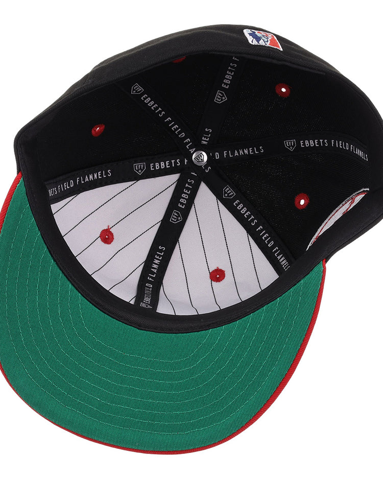 The Baltimore Elite Giants NLB Flip Fitted Ballcap by EFF has a green underbrim, red stitching, white pinstriped lining, and EBBETS FIELD FLANNELS printed along black inner seams for a classic vintage look.