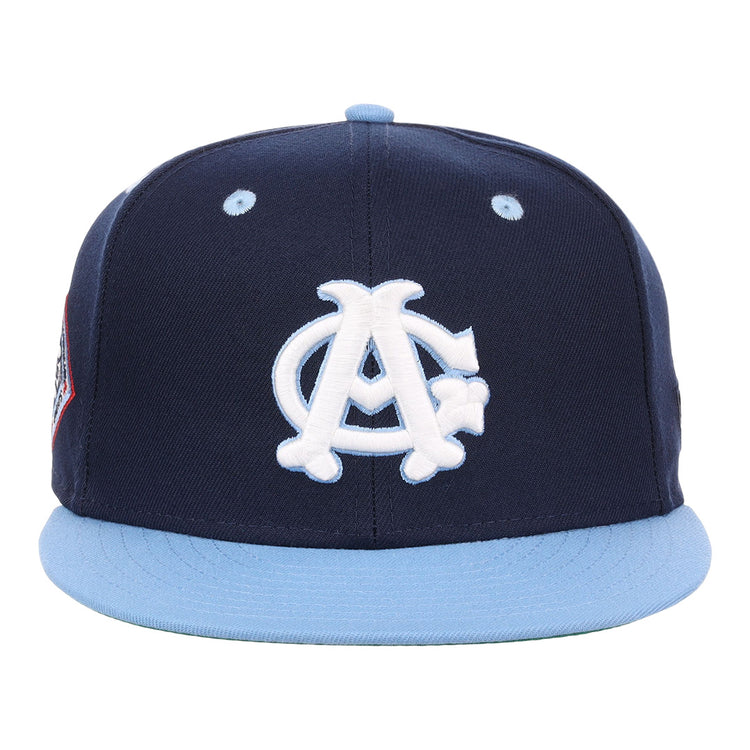 The EFF Chicago American Giants NLB Flip Fitted Ballcap features a navy crown, light blue brim, white intertwined A and C logo on the front, side patch, and vintage Negro League style.