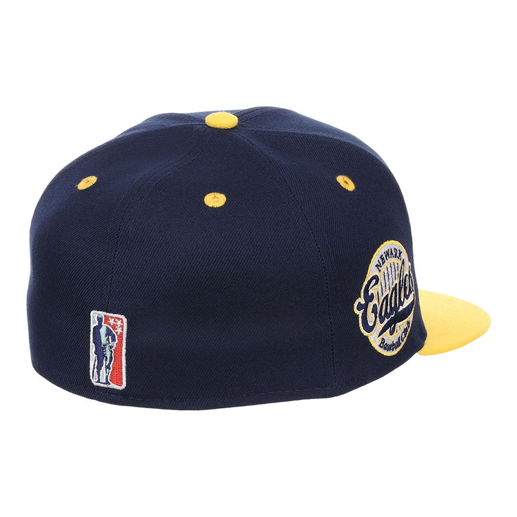 The EFF Newark Eagles NLB Flip Fitted Ballcap features a navy blue and yellow design, yellow button and eyelets, an embroidered Eagles patch on the side, and a Negro National League logo above the back opening.