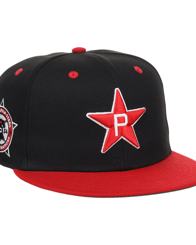The EFF Philadelphia Stars NLB Flip Fitted Ballcap is a black and red high crown cap featuring a star, paying tribute to the Negro National League.