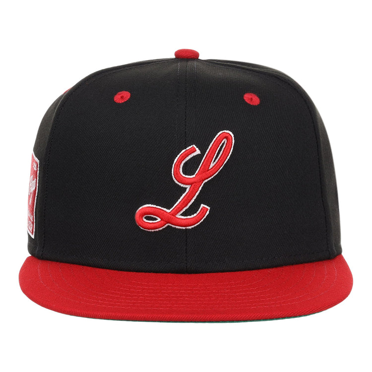 The EFF Louisville Black Caps NLB Flip Fitted Ballcap features a vintage look with a black crown, red brim and button, plus a bold red cursive L—celebrating the legacy of the Negro National League’s Louisville Black Caps.
