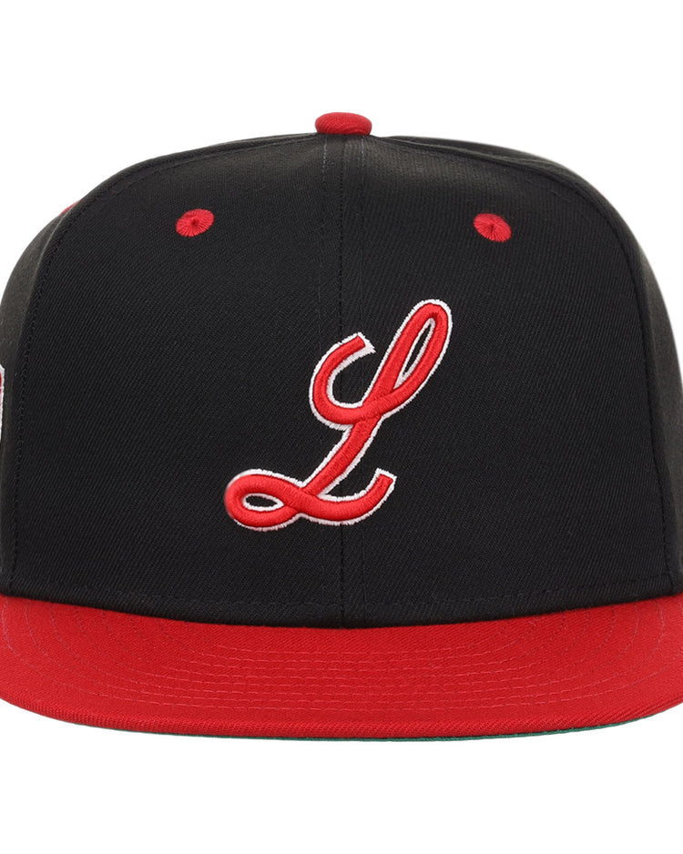 The EFF Louisville Black Caps NLB Flip Fitted Ballcap features a vintage look with a black crown, red brim and button, plus a bold red cursive L—celebrating the legacy of the Negro National League’s Louisville Black Caps.