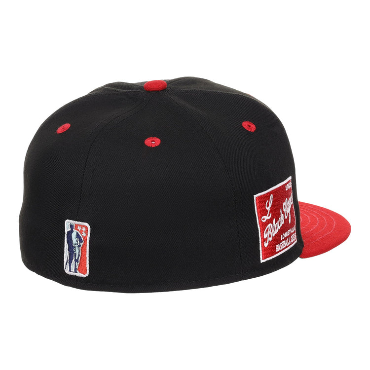 The EFF Louisville Black Caps NLB Flip Fitted Ballcap is a vintage-inspired black cap with a red brim and button, featuring two heritage patches—including one honoring the Negro National League team.