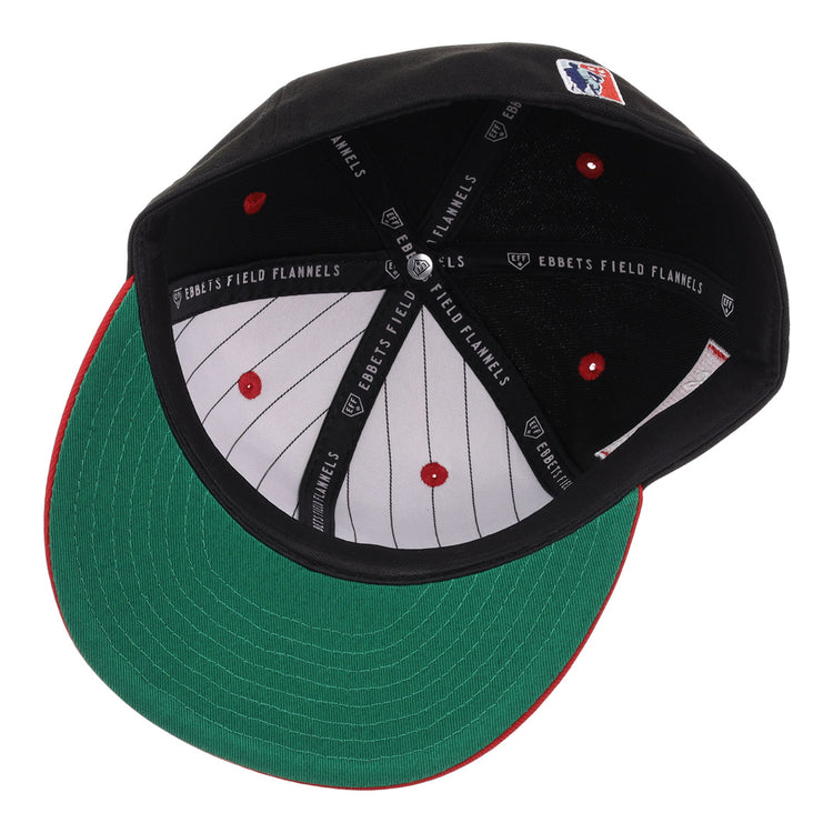 The EFF Louisville Black Caps NLB Flip Fitted Ballcap is a black vintage-inspired cap with a green underbrim, white pinstriped lining with red dots, and black inner bands labeled “Ebbetts Field Flannels.”.