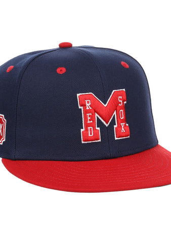 The EFF Memphis Red Sox NLB Flip Fitted Ballcap features a navy blue and red design, large red M with white outline, “RED SOX” on the front, a side Memphis Red Sox patch honoring the Negro American League team, plus a red bill and button.