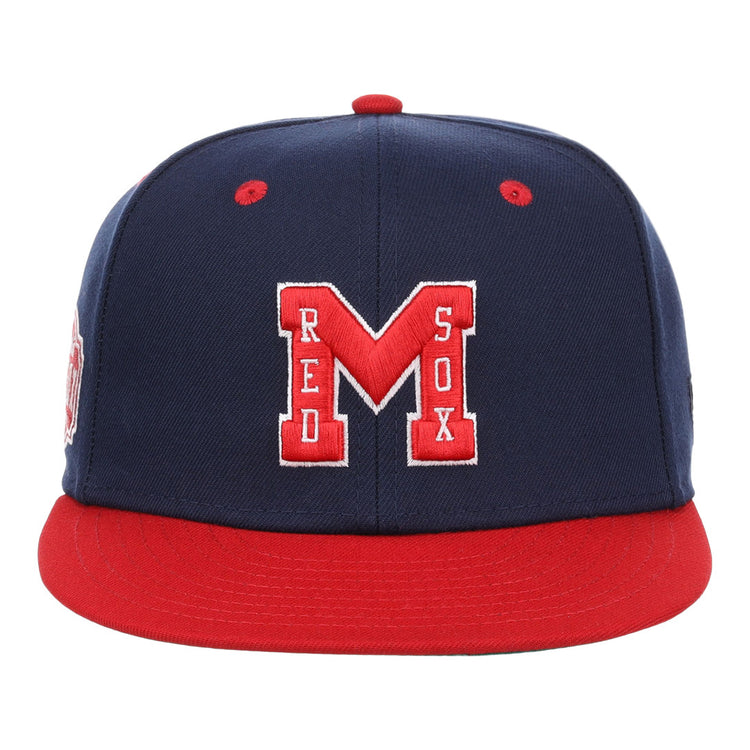 The EFF Memphis Red Sox NLB Flip Fitted Ballcap features a navy and red design with a bold red “M” outlined in white, RED SOX in white, and a solid red brim—honoring the Negro American Leagues Memphis Red Sox.