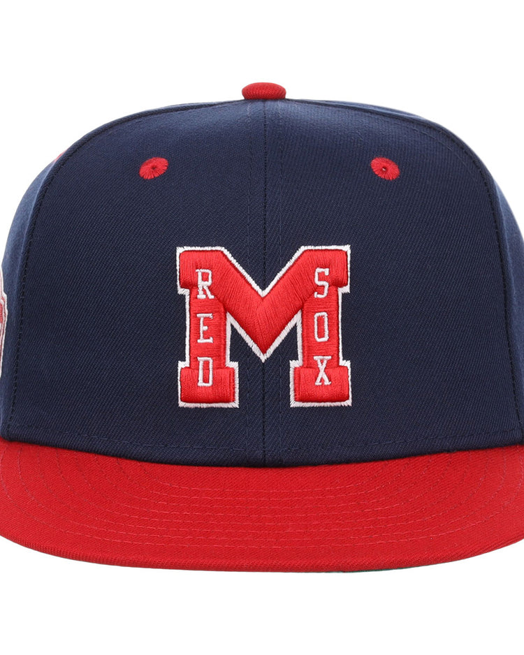 The EFF Memphis Red Sox NLB Flip Fitted Ballcap features a navy and red design with a bold red “M” outlined in white, RED SOX in white, and a solid red brim—honoring the Negro American Leagues Memphis Red Sox.