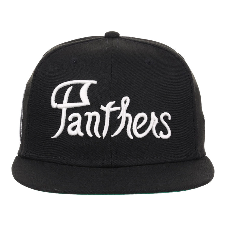 The EFF Montreal Black Panthers NLB Flip Fitted Ballcap is a vintage-inspired black cap featuring bold white Panthers embroidery on the front for a classic look.