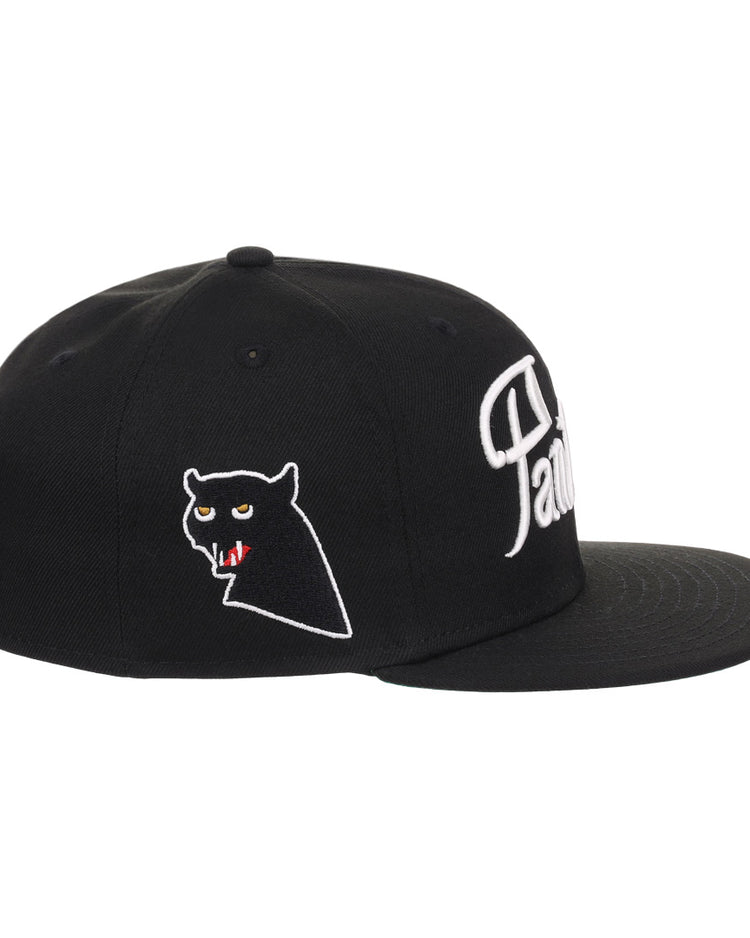 The EFF Montreal Black Panthers NLB Flip Fitted Ballcap features vintage inspiration, a black embroidered panther head with red accents, white side text, and classic snapback styling.