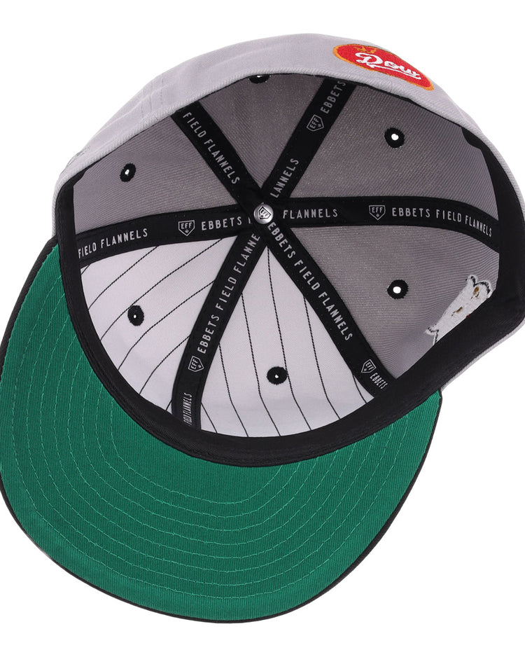 The inside of the EFF Montreal Black Panthers NLB Flip Fitted Ballcap - Gray features a green underbrim, white pinstriped lining, black bands with EBBETS FIELD FLANNELS text, and a red patch with Rosie in white script on top.