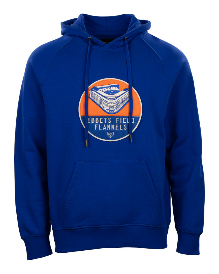 The EFF Ebbets Field Flannels French Terry Script Hooded Sweatshirt features a royal blue color, front pocket, drawstrings, and a circular orange and white logo with an illustrated stadium—ideal for Ebbets fans.