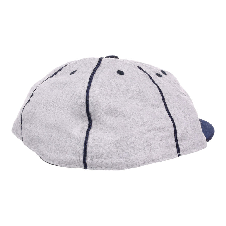 The EFF Columbia Park 1909 Vintage 8-Panel Ballcap features a gray design with dark blue stitching and ventilation holes, shown from back and side angles—a timeless choice for any Columbia Park Boys Club fan.