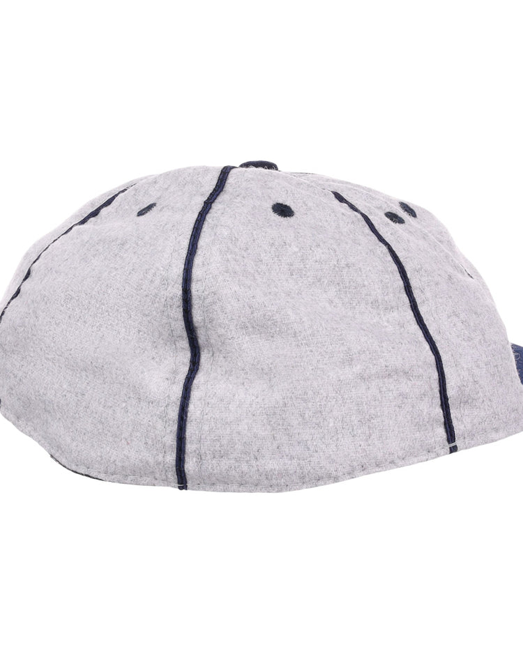 The EFF Columbia Park 1909 Vintage 8-Panel Ballcap features a gray design with dark blue stitching and ventilation holes, shown from back and side angles—a timeless choice for any Columbia Park Boys Club fan.