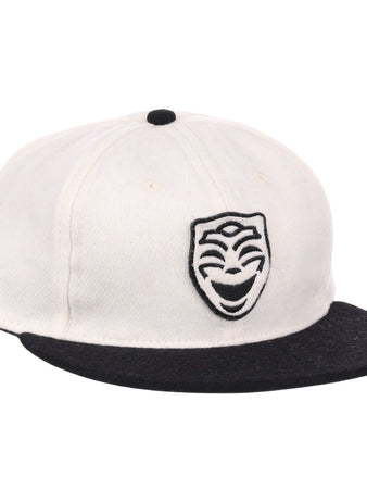 The EFF Thespians 1919 Vintage Ballcap is a white cap with a black brim and a black embroidered comedy mask logo, authentically reproduced from the classic 1919 design.