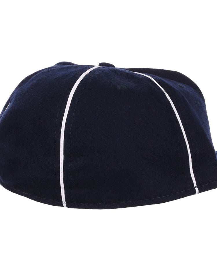 The EFF Santa Cruz Crabs 1908 Vintage Ballcap is dark blue with white vertical stripes, seen from the back, and features a soft, rounded shape plus a small brim made from genuine wool baseball cloth.