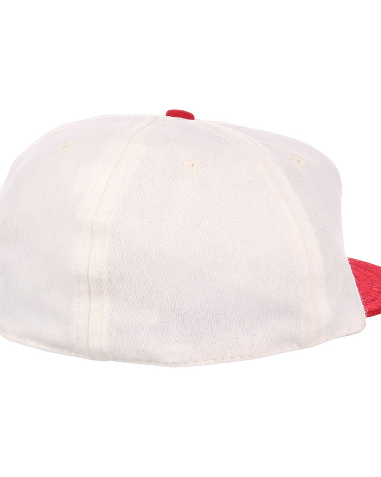 The EFF Nebraska State Prison 1923 Vintage Ballcap is a white wool cap with a red brim, visible stitching, and no logos or patterns, shown from the back and inspired by the original 1923 design.